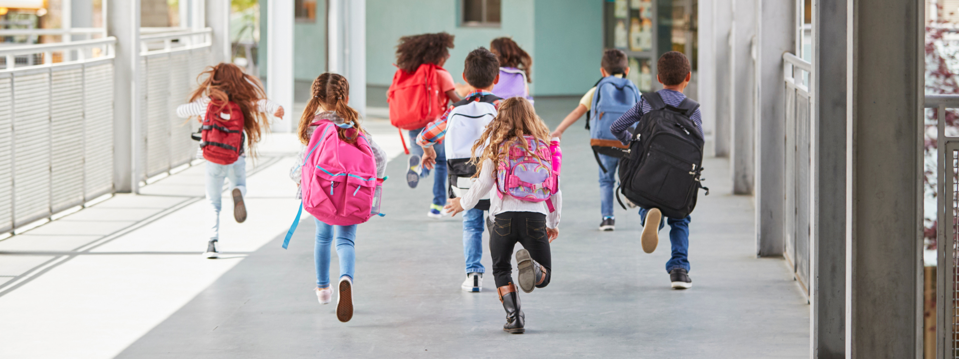 Children running the halls of a school